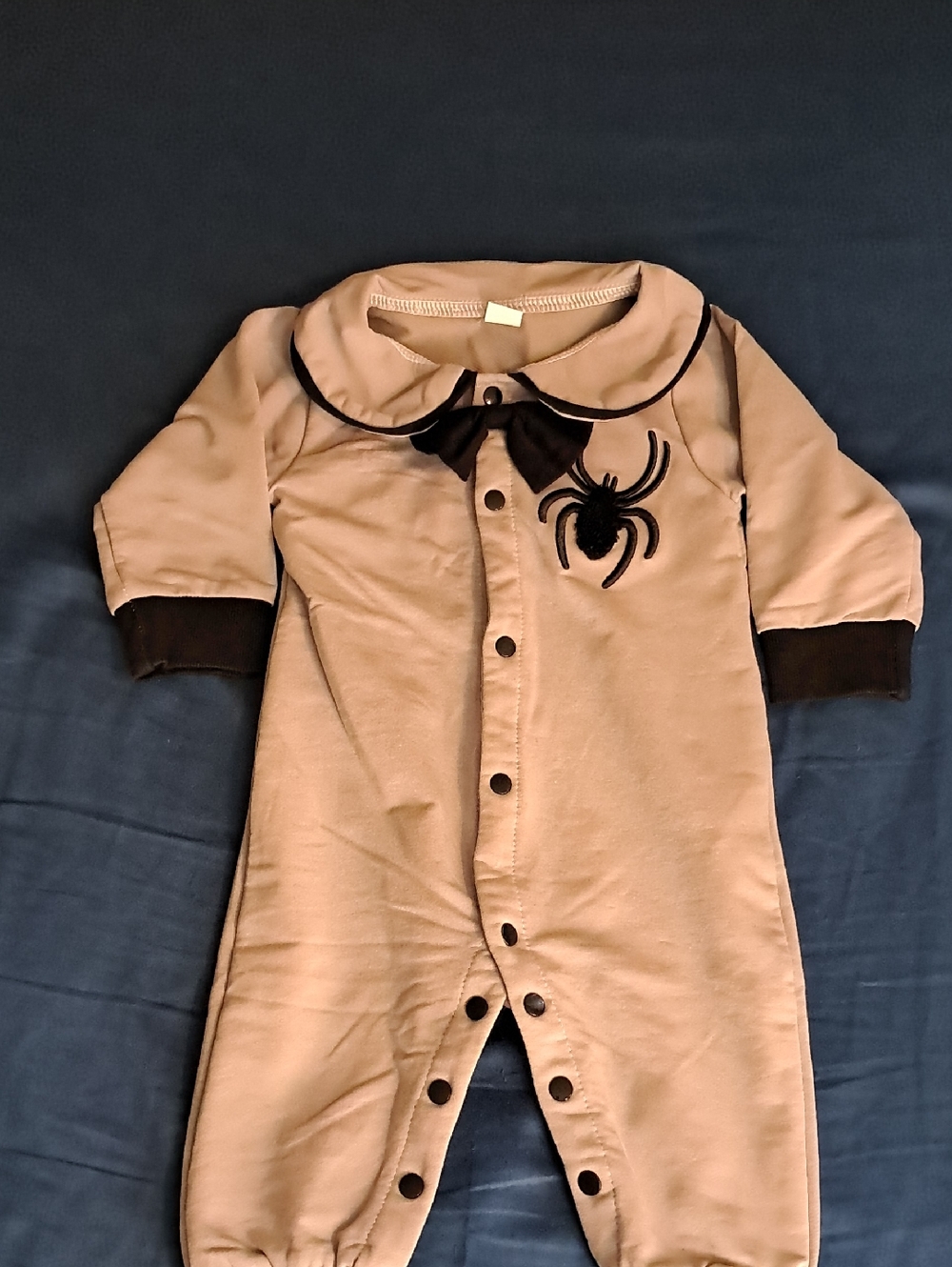 Neutral Tan Baby Romper with Black Spider Accent